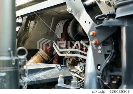Close view of intricate engine parts showing structure and design. High quality photo 126686568