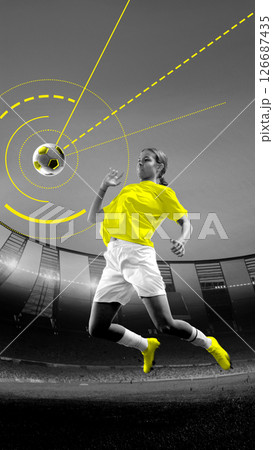 Female footballer in yellow outfit jumps to strike ball mid-air with highlighted tracking arcs and energetic layout. Conceptual art collage 126687435