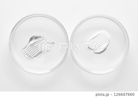 A sample of cosmetic moisturizing or anti-aging cream in a petri dish. A sample of cosmetic moisturizing or anti-aging cream in a petri dish. 126687660