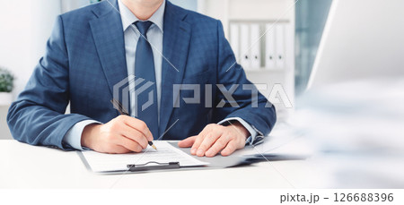Businessman at work, bookkeeping Businessman at work, bookkeeping 126688396