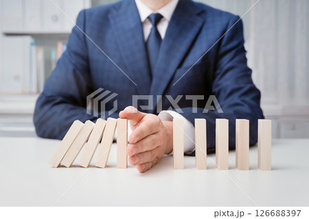 Domino business risk, crisis effect concept 126688397
