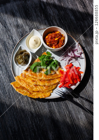 Top view of a plate of fajitas.  126688855