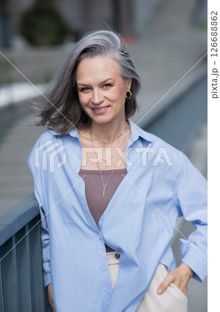 Portrait of a Caucasian mature woman with gray hair. Portrait of a Caucasian mature woman with gray hair. 126688862