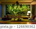 Dramatic Living Room with Moss Wall at Night 126690362