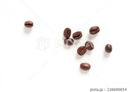 Coffee bean. Brown roasted coffee beans seeds isolated. Coffee bean on white background. Close up image. Coffee bean. Brown roasted coffee beans seeds isolated. Coffee bean on white background. Close up image. 126690654