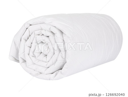 Soft white duvet neatly rolled up isolated on a clean white studio background. Soft white duvet neatly rolled up isolated on a clean white studio background. 126692040