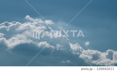 Stunning Cloudscape with Soft and Serene Blue Sky, Evoking a Sense of Calm and Peacefulness Time lapse. 126692611