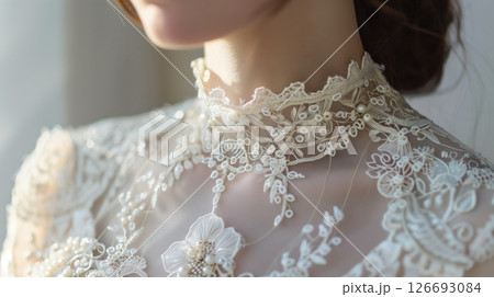 Lace accessories add delicate elegance to any outfit, like scarves, gloves, or trims that elevate your style. 126693084