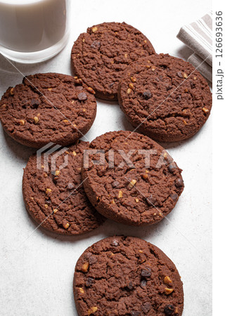 Chocolate chip cookies and glass of milk Chocolate chip cookies and glass of milk 126693636