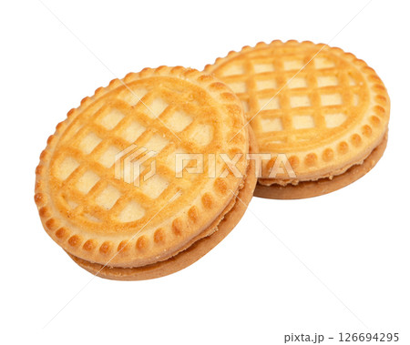 Sandwich biscuits with chocolate filling on a white background Sandwich biscuits with chocolate filling on a white background 126694295