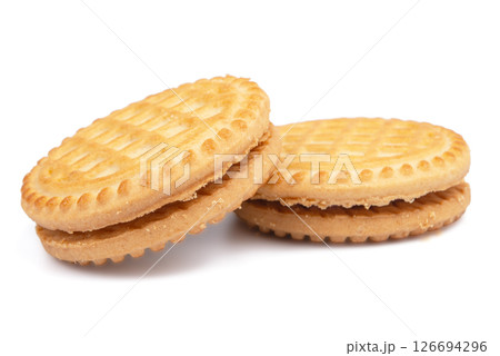 Sandwich biscuits with chocolate filling on a white background Sandwich biscuits with chocolate filling on a white background 126694296