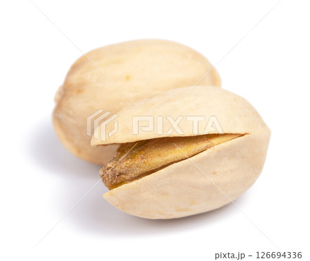 Tasty pistachio nuts on white background Tasty pistachio nuts on white background 126694336