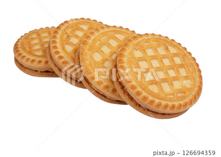 Tasty sandwich cookies with cream isolated on white Tasty sandwich cookies with cream isolated on white 126694359