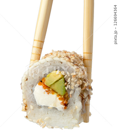Wooden chopsticks with sushi roll isolated on white background Wooden chopsticks with sushi roll isolated on white background 126694364