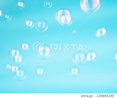 Soap bubbles on blue background blured selective 126695280
