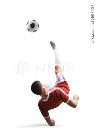 Young professional footballer in motion. Soccer kick. Soccer freestyle. Strong kick on the ball. Focus on the kick. Isolated 126697457