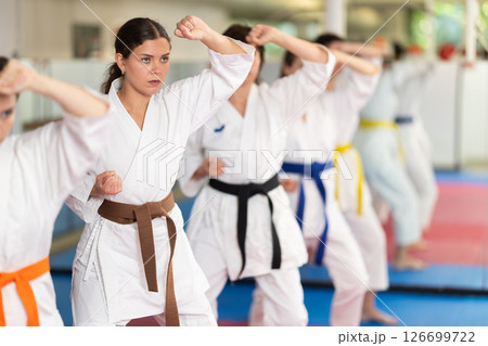 Women in a white kimono in training on a map 126699722