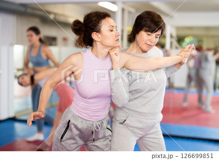 Women and girls in self-defense class 126699851