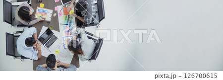 Banner Top view business people meeting together at office desk conference room. Team business meeting partnership planning brainstorming together. Team Collaborate group of partner with copy space Banner Top view business people meeting together at office desk conference room. Team business meeting partnership planning brainstorming together. Team Collaborate group of partner with copy space 126700615