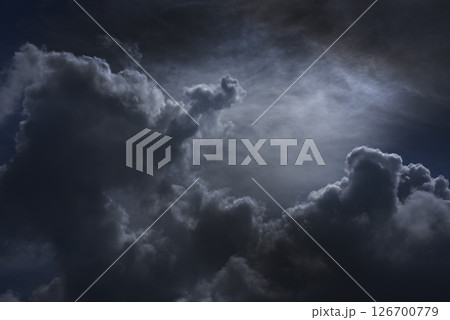 Dramatic dark storm thundercloud rain clouds on black sky background. Dark thunderstorm clouds rainny landscape. Meteorology danger windstorm disaster climate. Dark cloudscape storm disaster gray sky Dramatic dark storm thundercloud rain clouds on black sky background. Dark thunderstorm clouds rainny landscape. Meteorology danger windstorm disaster climate. Dark cloudscape storm disaster gray sky 126700779