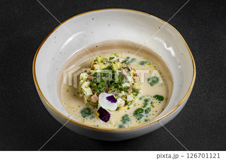 Cold summer soup okroshka. Light soup in a white bowl. Cold summer soup okroshka. Light soup in a white bowl. 126701121