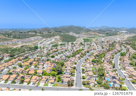Aerial view of San Marcos neighborhood, with houses and street. South California Aerial view of San Marcos neighborhood, with houses and street. South California 126701979