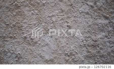 High-resolution texture of a rough plastered wall surface in natural cement tone. Perfect for 3D modeling, architectural renders, and grunge background design 126702116