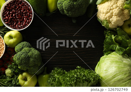 Set of vegan protein products on wooden background, space for text 126702749