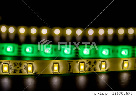 Close-up of LED strips glowing in the dark 126703679