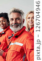 Diverse team of emergency medical technicians preparing for the day ahead 126704946