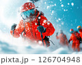 Mountain rescuers prepare equipment for challenging ascent in snowy conditions 126704948