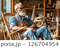 Experienced craftsman restoring an antique rocking chair in a cozy workshop setting 126704954