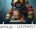 Firefighter rescues child during emergency response in heavy rain 126704957