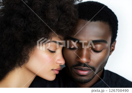 A man and a woman are hugging each other 126708490
