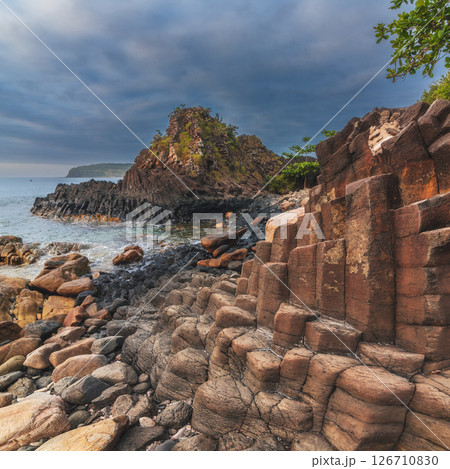 Da Dia reef in Vietnam. Panoramic landscape with volcanic basalt columns Ganh Da Dia on the beach by the sea in the Phu Yen province 126710830