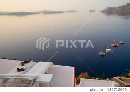 chair beds and view of Santorini caldera chair beds and view of Santorini caldera 126712666