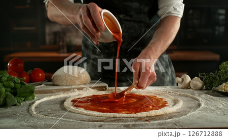 Closeup of Chef Making Pizza in Restaurant . Closeup of Pizza Preparation 126712888