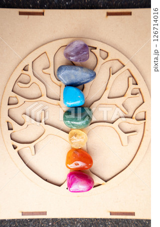Healing crystals on brown background 126714016