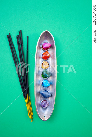seven chakras stones, energy healing concept 126714059