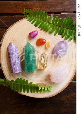 Healing crystals on brown background 126714062