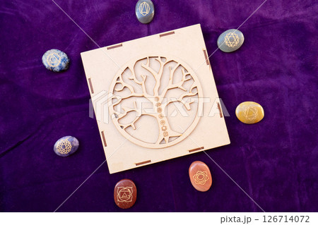 Healing crystals on brown background 126714072
