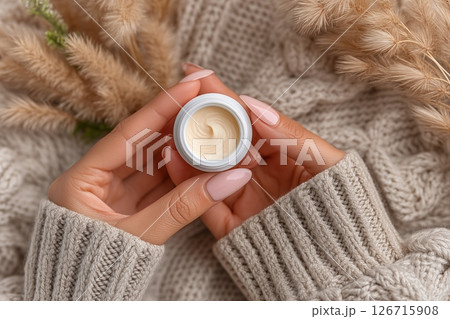 Cozy Winter Moments: A Woman's Gentle Embrace of Warmth and Comfort Cozy Winter Moments: A Woman's Gentle Embrace of Warmth and Comfort 126715908