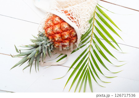 pinapple on white wooden table 126717536