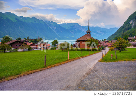 Swiss Reformed Church in Iseltwald with Lake Brienz View Swiss Reformed Church in Iseltwald with Lake Brienz View 126717725