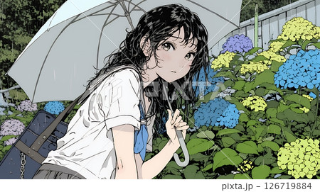アジサイと梅雨の長雨と若い女性