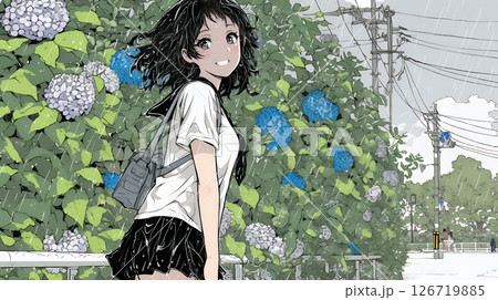 アジサイと梅雨の長雨と若い女性