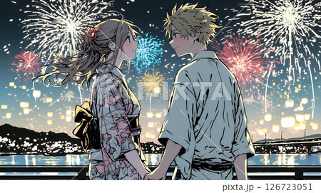 打ち上げ花火を見ている若いカップル
