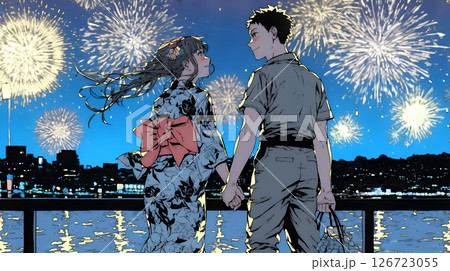 打ち上げ花火を見ている若いカップル