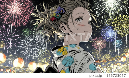 打ち上げ花火を見ている浴衣を着た若い女性