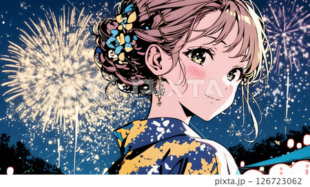 打ち上げ花火を見ている浴衣を着た若い女性